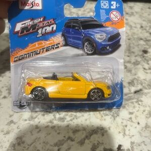 Maisto Yellow Convertible Die-Cast Toy Car